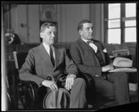 Harry Pollock and Tom Kennedy sit together in court during Kid McCoy's murder trial, Los Angeles, 1924