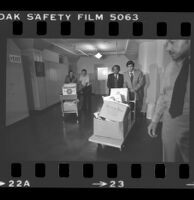 State Senator Alan Robbins and Reverend W. C. Jackson wheeling antibusing initiative petitions into the Los Angeles County Registrar-Recorder's office, 1978