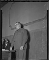 Captain E. Raymond Cato speaks during a safety aid meeting, Los Angeles, 1935