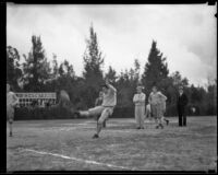 Frank Alustiza punts the football during Stanford's practice, Pasadena, circa 1934