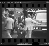 Viktor Ivanovich Belenko, Soviet defector, being led by decoy at Los ...