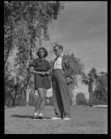 Jinx Falkenburg and Gregory Ratoff stand together, Palm Springs, 1935