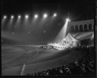 Costumed shriners, stage, and spectators at Los Angeles Memorial Coliseum, 1935