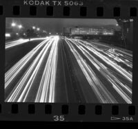 Night photograph, streams of automobile lights on Harbor Freeway, Los Angeles, 1987