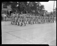 Members of the Ancient Arabic Order of the Nobles of the Mystic Shrine for North America (Shriners) parading at Durbar, Los Angeles, 1934