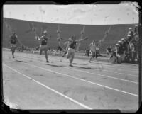 S.C. sprinter crosses the finish line during a race at the S.C. and Stanford dual track meet, Los Angeles, 1934