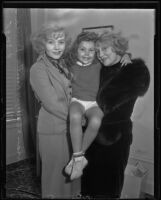 Actresses and sisters Rosetta Duncan and Vivian Duncan hold Vivian's daughter, Evelyn, Los Angeles, 1935