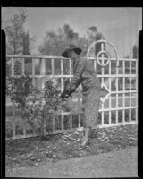 Anna Laura Barnett tends to the garden, Los Angeles, 1936