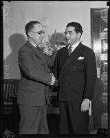 Municipal Court Judges Clement D. Nye and Joseph Marchetti shaking hands, Los Angeles, 1934