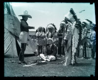 Crown Prince Gustav Adolf of Sweden with Arapaho tribe members and Tim McCoy at MGM studio, Culver City, 1926