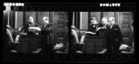 Jerry Giesler attending the Alexander Pantages trial standing with others, Los Angeles, 1929