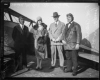 Actress Helene Millard, pilot H.A. Speer, Judge William S. Baird, and another man with airplane, [1927?]