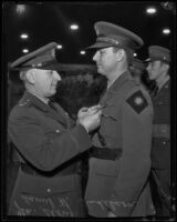 General Story awards medal to Daniel H. Hudelson, Los Angeles, 1935