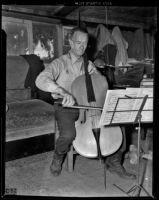 Jack Shadle plays on his cello, Los Angeles, 1938