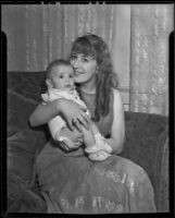 Carmen Saucedo holds her two month old daughter, Los Angeles, 1936