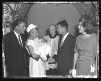 Peter and Pat Lawford with group outside of church after christening of their fourth child in Santa Monica, Calif., 1961