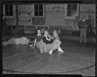 Ann McNaghten and friends at Venice Beach fun house, Venice (Los Angeles), 1936