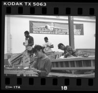 Aircraft workers building C-5B at Lockheed's Watts-Willowbrook Plant, Calif., 1988