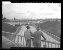 Two men on bridge at Boyle Ave. looking out over the Santa Ana Parkway, Los Angeles, 1947
