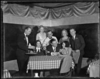 David Hutton and Kitty Chapman drinking at table with friends at a club, Los Angeles, 1933