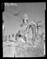 Our Lady of Guadalupe as portrayed on parade float by Maria Duran in Los Angeles, Calif., 1958