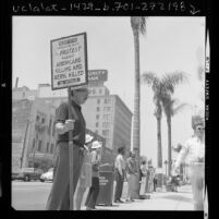 Robert O. Hahn of Orange Grove Friends Meeting, holding silent peace vigil in Pasadena, Calif., 1972