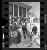 Children watching a mime perform during festival at the Music Center in Los Angeles, Calif., 1977