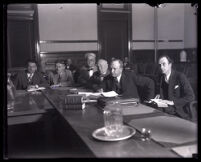 Former district attorney Asa Keyes with his defense team during his bribery trial, Los Angeles, 1929