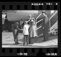 Vietnam POW returnee Air Force Major Hayden J. Lockhart Jr. with his son and wife at Travis Air Force Base, Calif., 1973