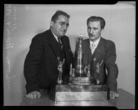 Two men and large chess trophy, Los Angeles, 1935