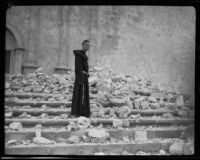 Brother Michael Lamm on the steps of the Santa Barbara Mission Church after the earthquake, 1925