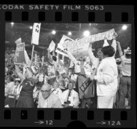 Michigan delegates waving Ford and Reagan placards during 1976 Republican National Convention in Kansas City, Missouri