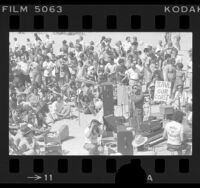 Henry Gibson speaking at rally of PACE (People, Access, Coastal Environment) in Santa Monica, Calif., 1976