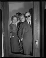 William F. Gettle, kidnapping victim, standing with four unidentified persons, Los Angeles, 1934