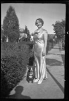 Ruth Davis, candidate for ordination, Spiritual Psychic Science Church, and dog, 1936