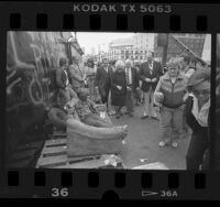 Maureen Kindel inspecting homeless sidewalk encampment on Skid Row in Los Angeles, Calif., 1987