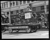 Hand-drawn steamer on view at a Transportation Day parade during La Fiesta de Los Angeles celebration, Los Angeles, 1931