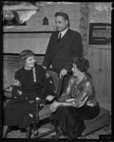 Chief of Police James Davis poses with his current secretary Margaret R. Connor and former secretary Alida C. Bower, Los Angeles, 1935