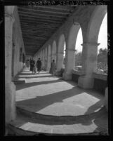 Know Your City No.109 Women and child walking the arcade of the San Fernando Mission, San Fernando, Calif