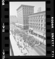 March marking 55th anniversary of women's suffrage along Spring Street in Los Angeles, Calif., 1975