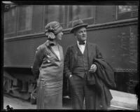 Greta and Robert A. Millikan at a train station, Los Angeles, 1920-1939