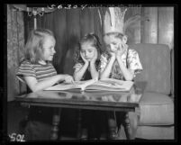 Arabian children Adel and Houda Kiwan play in the Children's Home of the Volunteers of America, Calif., 1949