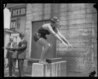 Mariechen M. Wehselau, future Olympic Gold Medal winner, posing for a dive, Los Angeles, 1924