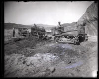 Workers clear flood debris after the failure of the Saint Francis Dam, Santa Clara River Valley (Calif.), 1928