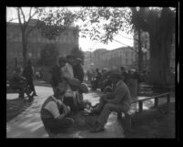 Shoeshine boys working in the Old Plaza of Los Angeles, circa 1930