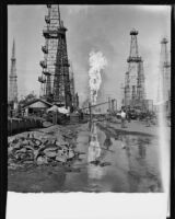 Oil well fire, Santa Fe Springs, 1928