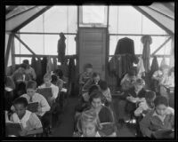 Children reading at the 49th street school, Los Angeles County, 1935