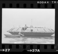 Chris Christensen, aboard his houseboat that resembles a flying saucer in Los Angeles Harbor, Calif., 1975