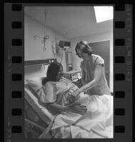 Nurse Pat Clinton with patient, Mt. Sinai Hospital, Los Angeles, 1976