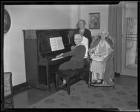 Josephine O'Leary, Mrs. Emma Cauley, and Mrs. Bessie Barrie around piano, 1935
